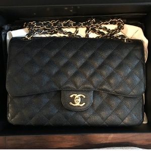 Chanel Jumbo Black caviar double flap.